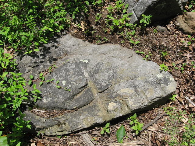 Bases of monuments were made from rock on battlefield.  Leftover piece of rock.