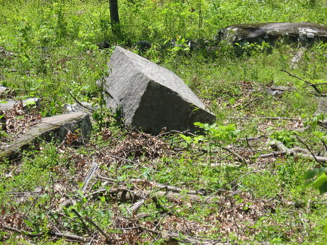 Bases of monuments were made from rock on battlefield.  Leftover piece of rock.