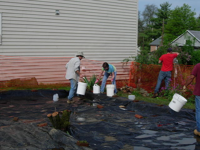 Removing water from the site.  Rainy summer - many mornings of removing water