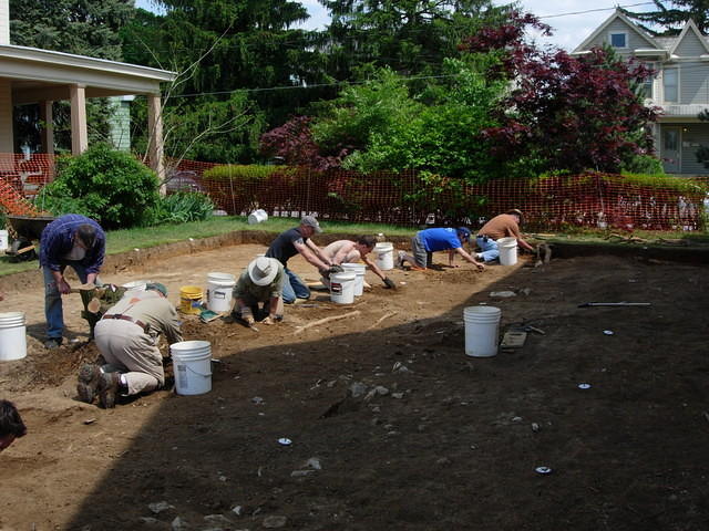 Cleaning off the last of layer two (clay fill)