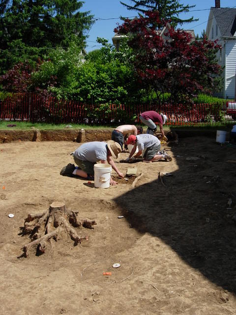 Removing soil from last years test holes