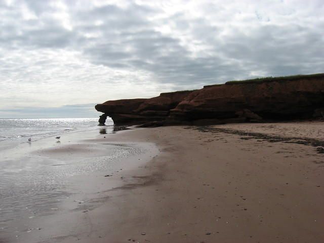 Red sandstone cliffs at Penderosa Beach (leaning part now gone)