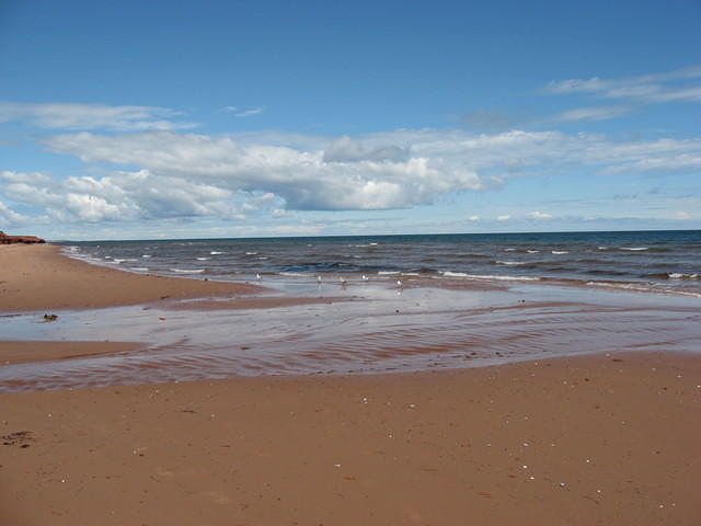 At high tide water runs into small lake.  At low tide (here) water running back from lake to sea