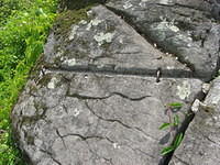 Area on Trough Rock where drain pipe used to run.  Across from Devil's Den.