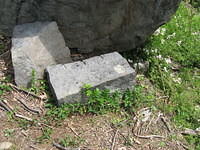 Bases of monuments were made from rock on battlefield.  Leftover piece of rock.