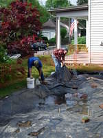 Removing water from the site.  Rainy summer - many mornings of removing water