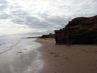 More red sandstone cliffs at Penderosa Beach