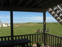 Looking from our cottage front door toward dunes.  Yellow building on left is old cottage.  These are not rented anymore.  Stayed in one in 2001.