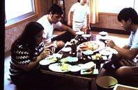 Carol, Dave, Mike, Kato eating crab dinner